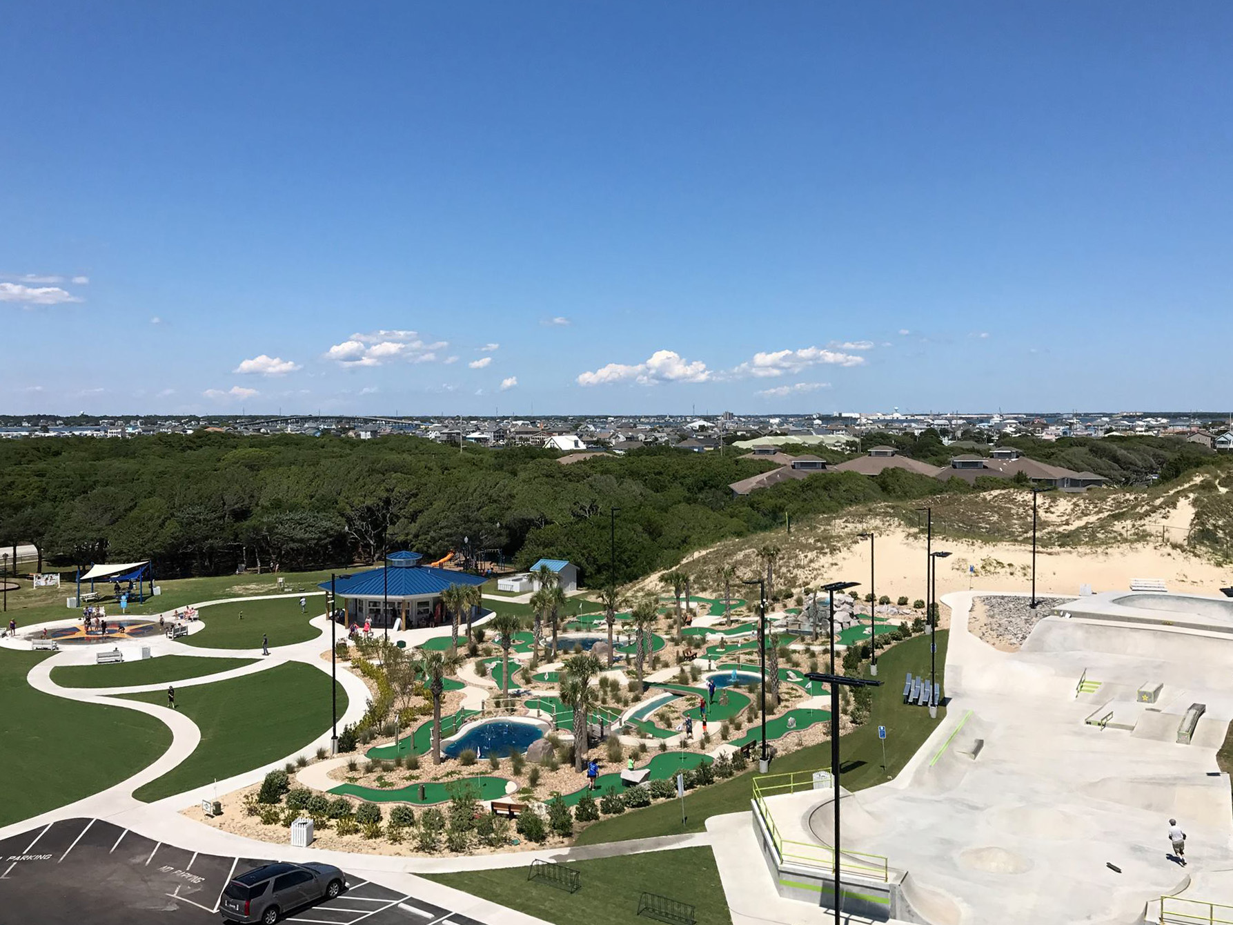 Atlantic Beach Park with mini golf, splash pad, skate park and playground beside the dunes