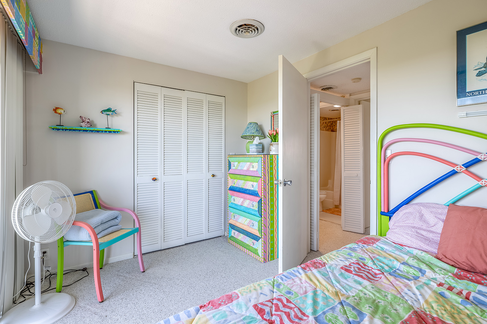 Children's bedroom with colorful furniture at Coral Shores 12