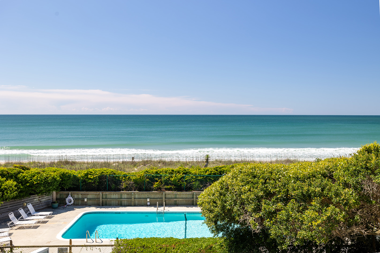 Swimming pool overlooking the ocean at Coral Shores 12
